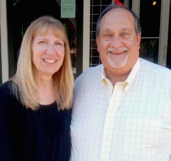 Rich and Laura Azzolino In Front Of Their Sotto Mare On A Sunny Day