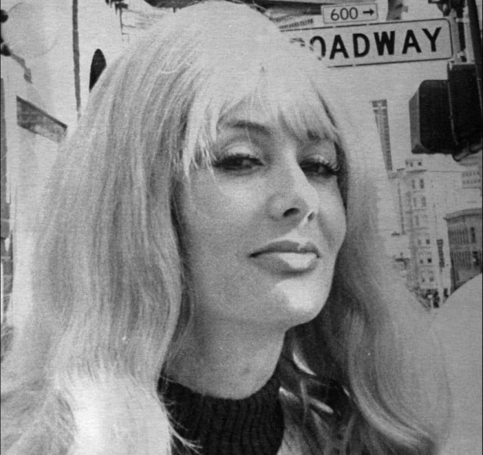 The fascinating Carol Doda in front of the Condor Club on Broadway, 1982